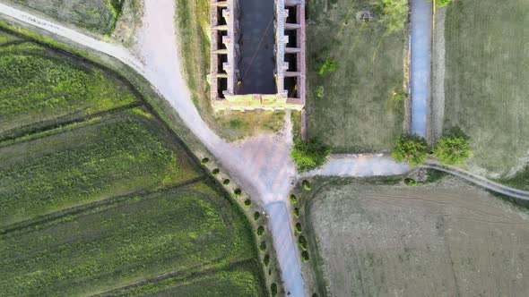 Amazing Aerial View of Beautiful San Galgano Abbey with Roofless Walls Tuscany Hills in Spring