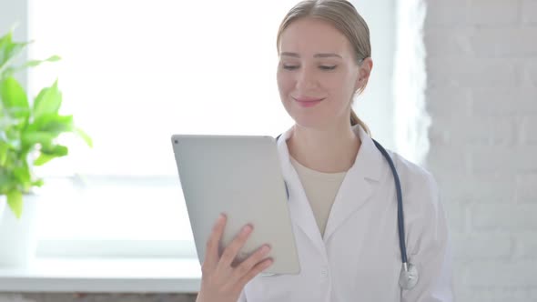 Online Video Call on Tablet By Lady Doctor
