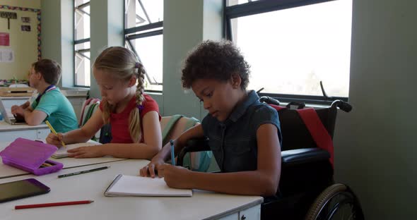 Two girls studying in the class