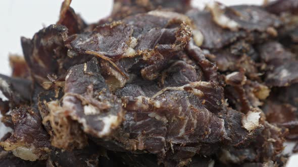 Plate Of South African Biltong A Dried Out Meat Cut Into Small Snack Size Pieces. - Closeup Shot