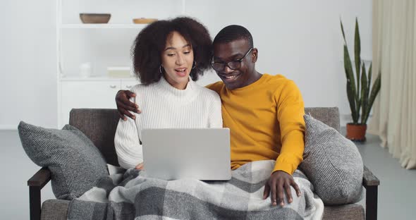 Young Afro American Family Couple Talking Video Calling From Home