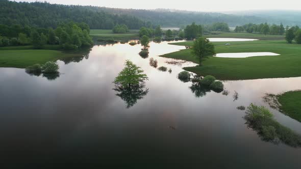 Flooded countryside after a heavy rain with fields and roads