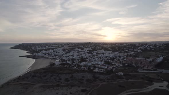 Stunning coastal landscape of Algarve. Sprawling city and beach, Praia da Luz.