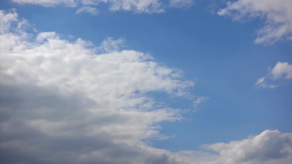 Clouds Cover the Blue Sky, Timelapse. Air Flows in the Atmosphere