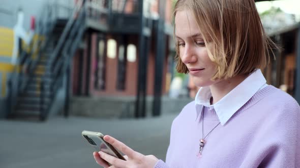 Happy Woman Using Smartphone Enjoying Chat