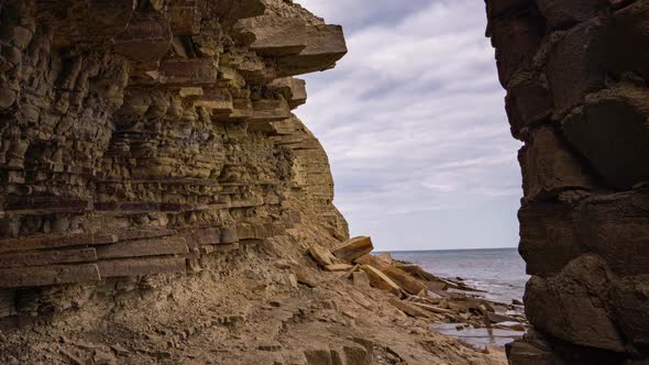 Camera Movement From a Rocky Coast with Tide Pools to the Sea