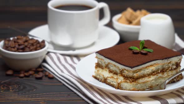 Portion of Traditional Italian Tiramisu Dessert Cup of Espresso Milk  Brown Sugar and Coffee