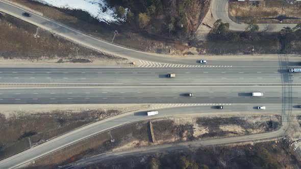 Bird'seye View of the Roundabout Cars Moving Fast Along the Road