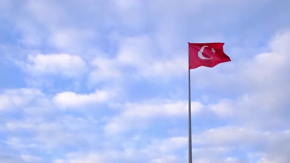 Turkish Flag Waving in Blue Sky