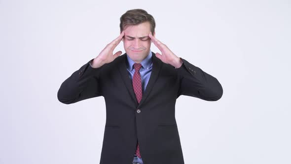 Young Stressed Businessman Having Headache