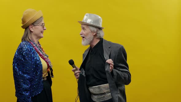 Stylish Elderly Woman On Yellow Background