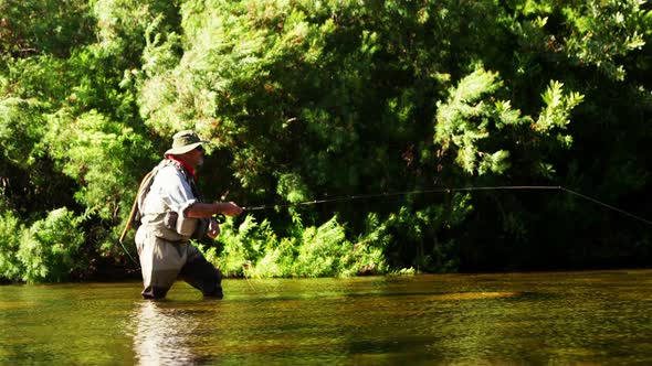 Man fly fishing in river