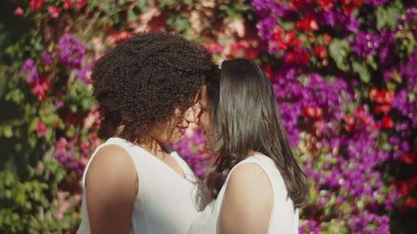 Excited Lesbian Couple Hugging and Getting Ready for Wedding