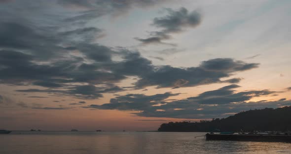 Timelapse Sunrise From Dark to Bright Day Sun Over Sea Waves are Washing