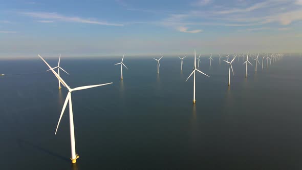 Wind Turbines in the Early Morning Wind Mill Park in the Netherlands