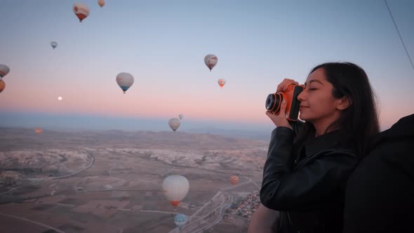 Woman Take a Photos of Balloons