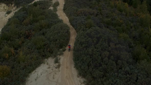 Enduro Motorcycle Rides Offroad on the Sands