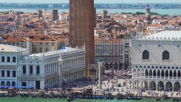 Crowds of Tourists Walking on Saint Mark's Square in Venice