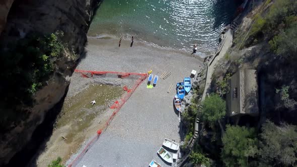 Fiordo di Furore fjord village on the Amalfi coast near Salerno Italy with boats seen from above, Ae