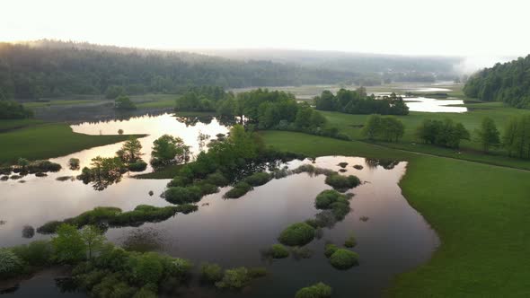 Flooded countryside after a heavy rain with fields and roads