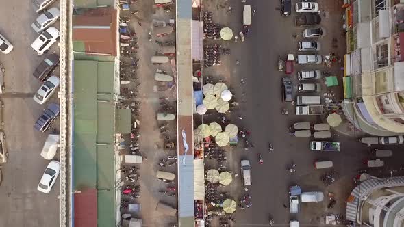 Aerial view above of crowded street market, Phnom Penh, Cambodia.