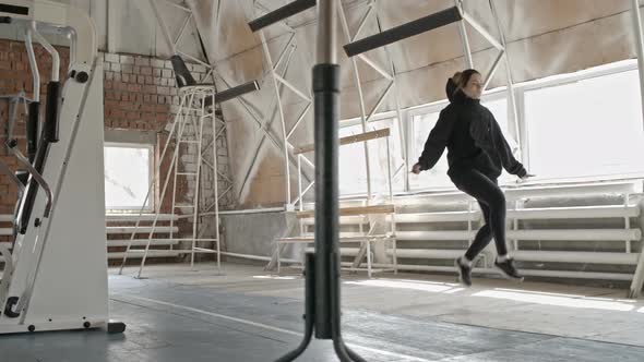 Woman Doing Boxing Jump Rope Workout