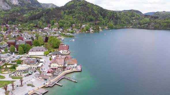 Aerial View of Mountain Lake Wolfgangsee with Houses of Resort Town in Austria, Alps