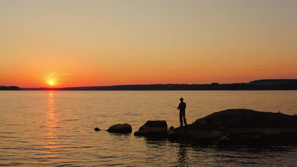 People fishing in the evening