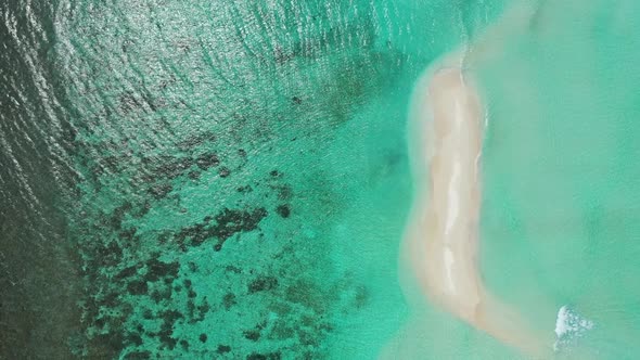 Aerial tourism of relaxing lagoon beach journey by shallow lagoon and white sand background of a day