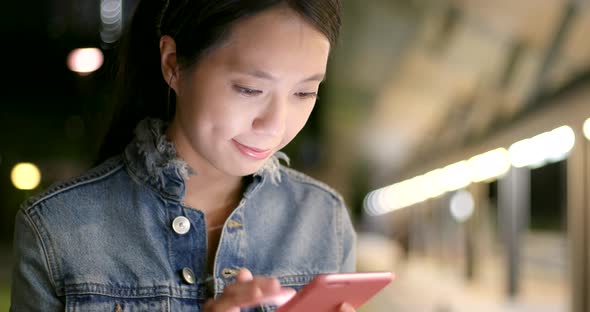 Woman use of mobile phone for online