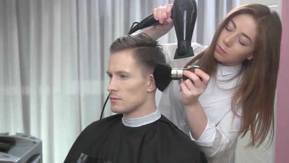 Female Barber Using Duster Brush