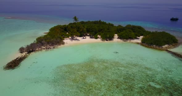 Beautiful birds eye clean view of a sunshine white sandy paradise beach and turquoise sea background