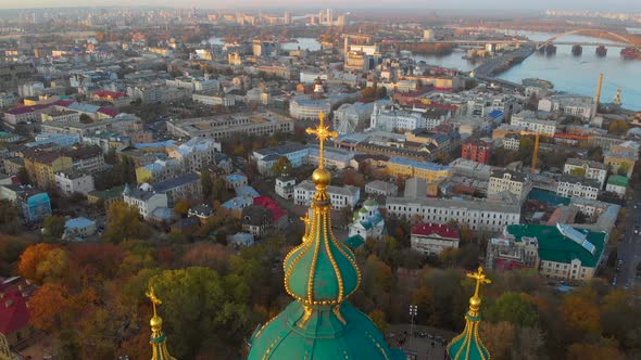 Drone Flying Over Church of St. Andrew at Sunset