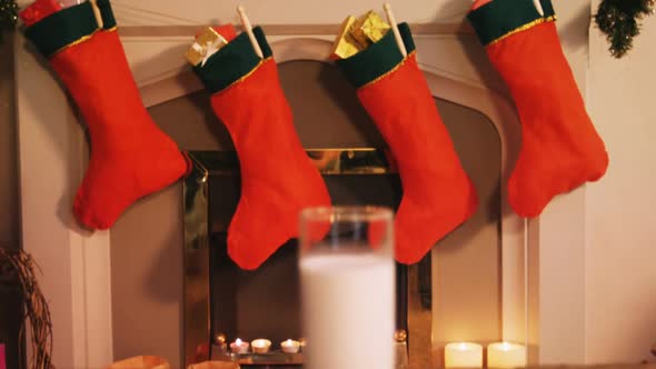 Gingerbread cookies with a glass of milk on wooden table