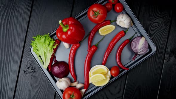 Ingredients for Hot Tomato Sauce on a Black Background