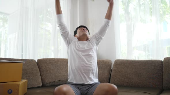 Slow Motion Portrait of Very Happy Successful Cheering Man Throwing Money Up