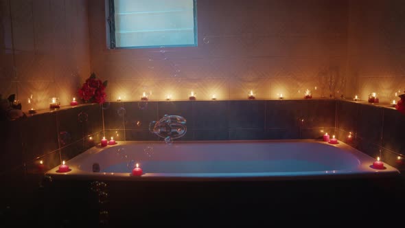 Bathtub with Bubbles Falling Into a Romantic Set