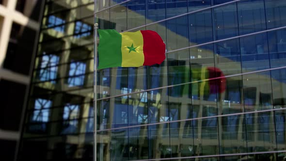 Senegal Flag Waving On A Skyscraper Building