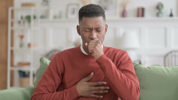 Portrait of Sick African Man Coughing