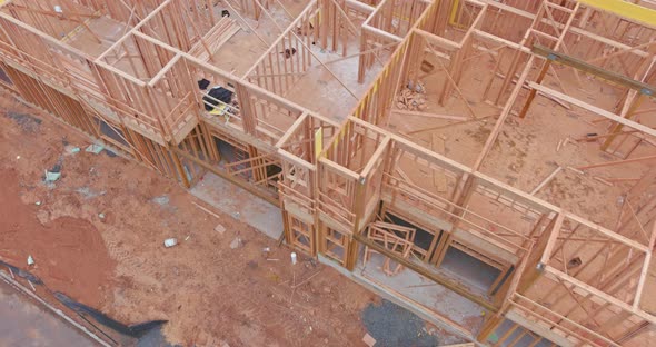 Framing of under construction wooden house building frame structure on a new development