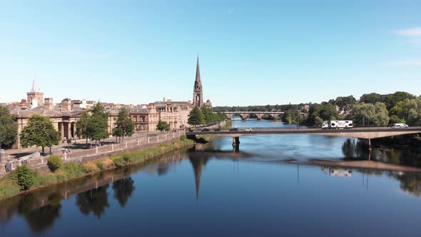 City of Perth and River Tay on a beautiful sunny day. Scotland, United Kingdom. Drone gaining altitu