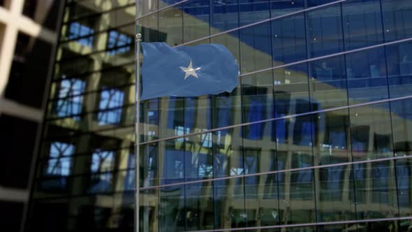 Somalia Flag Waving On A Skyscraper Building