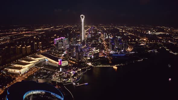 CBD buildings by Jinji Lake at night in Suzhou