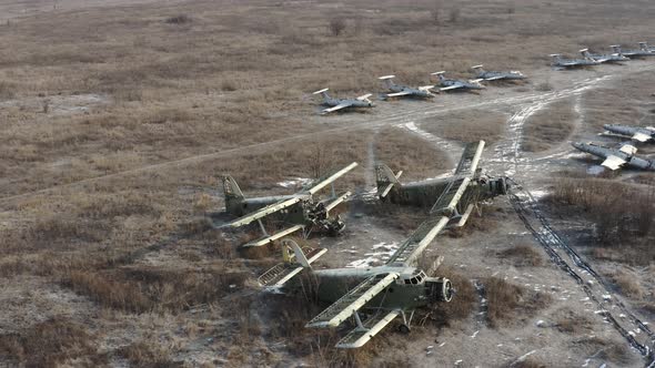 Three Broken Transport Planes An2  Colt  Light Transport Aircrafts Biplanes on the Airfield