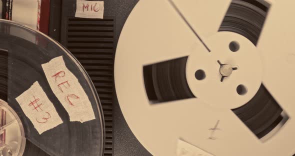 Vintage audio reel player. Reel audio recorder with tape rolls.