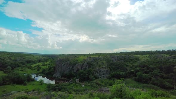 White Fluffy Clouds over the Canyon