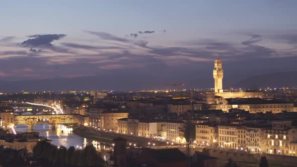 evening panning right view from the ponte del vecchio to the duomo, florence