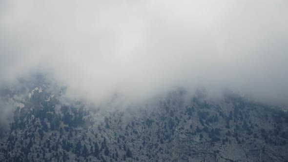 Fast Clouds Among Rocky Mountains