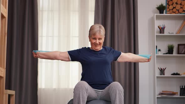 Old Retired Woman Exercising