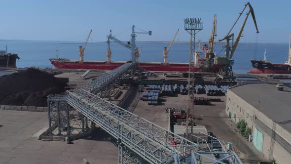 Loading of a Merchant Ship in Port with Grain Using a Belt Gallery